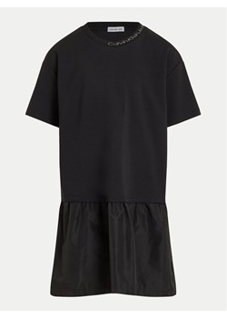 Calvin Klein Jeans Sukienka codzienna Mix Media Intrasia IG0IG02576 D Czarny Regular Fit ze sklepu MODIVO w kategorii Sukienki dziewczęce - zdjęcie 182704121