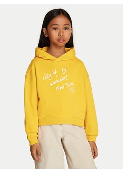 Calvin Klein Jeans Bluza City Graphic IG0IG02645 Żółty Regular Fit ze sklepu MODIVO w kategorii Bluzy dziewczęce - zdjęcie 182705262