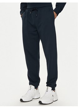 Armani Exchange Spodnie dresowe 6DZPJM ZJADZ 1510 Granatowy Regular Fit ze sklepu MODIVO w kategorii Spodnie męskie - zdjęcie 182705463