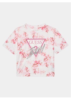Guess T-Shirt J4RI06 K6YW3 Różowy Boxy Fit ze sklepu MODIVO w kategorii Bluzki dziewczęce - zdjęcie 182706452