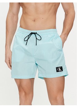 Calvin Klein Swimwear Szorty kąpielowe KM0KM00980 Niebieski Regular Fit ze sklepu MODIVO w kategorii Kąpielówki - zdjęcie 182707873