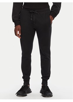 Dolce&Gabbana Spodnie dresowe GVXQHT G7F2G Czarny Regular Fit ze sklepu MODIVO w kategorii Spodnie męskie - zdjęcie 182708384