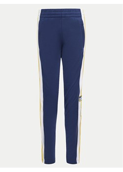 adidas Spodnie dresowe Adibreak IM8434 Granatowy Regular Fit ze sklepu MODIVO w kategorii Spodnie chłopięce - zdjęcie 182708854