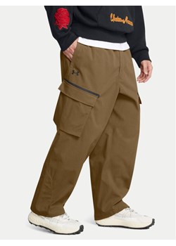 Under Armour Spodnie materiałowe Unstoppable 1388827 Brązowy Loose Fit - id: 0000304111884 - marki Under Armour - 182711171 Under Armour Spodnie materiałowe Unstoppable 1388827 Brązowy Loose Fit ze sklepu MODIVO w kategorii Spodnie męskie - zdjęcie 182711171