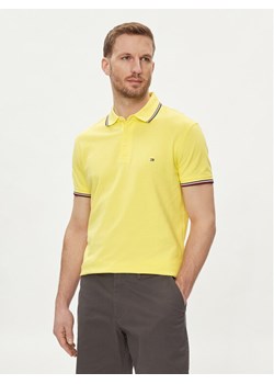 Tommy Hilfiger Polo 1985 MW0MW30750 Żółty Slim Fit ze sklepu MODIVO w kategorii T-shirty męskie - zdjęcie 182714322