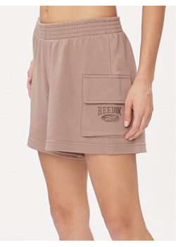 Reebok Szorty sportowe Archive Essentials IL6288 Beżowy Regular Fit ze sklepu MODIVO w kategorii Szorty - zdjęcie 182714741