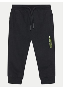 Coccodrillo Spodnie dresowe WC5120101VBA Czarny Regular Fit ze sklepu MODIVO w kategorii Spodnie chłopięce - zdjęcie 182714881