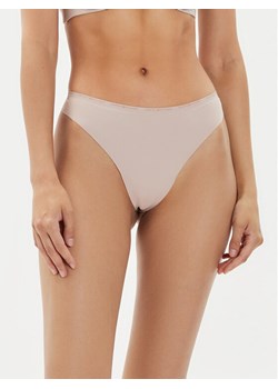 Tommy Hilfiger Stringi UW0UW05214 Beżowy ze sklepu MODIVO w kategorii Majtki damskie - zdjęcie 182715220