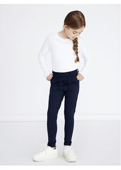 NAME IT Spodnie materiałowe 13142465 Granatowy Regular Fit ze sklepu MODIVO w kategorii Spodnie dziewczęce - zdjęcie 182715450
