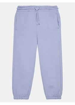 OVS Spodnie dresowe 2073799 Fioletowy Regular Fit ze sklepu MODIVO w kategorii Spodnie dziewczęce - zdjęcie 182716863