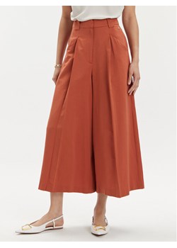 Tamaris Apparel Kuloty Carentan TAW0532 Pomarańczowy Relaxed Fit ze sklepu MODIVO w kategorii Spodnie damskie - zdjęcie 182717442