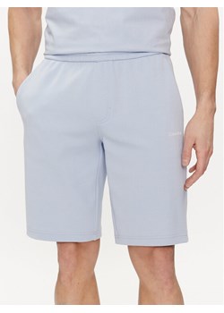 Calvin Klein Szorty sportowe Micro Logo K10K111208 Niebieski Regular Fit ze sklepu MODIVO w kategorii Spodenki męskie - zdjęcie 182718322
