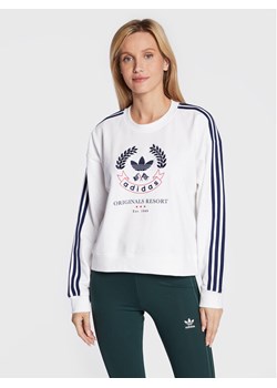 adidas Bluza Graphic HL6558 Biały Loose Fit ze sklepu MODIVO w kategorii Bluzy damskie - zdjęcie 182718642