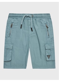 Guess Szorty materiałowe N2RD01 D3XN0 Niebieski Regular Fit ze sklepu MODIVO w kategorii Spodenki chłopięce - zdjęcie 182718914