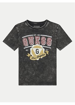 Guess T-Shirt L5RI08 K8HM4 Czarny Regular Fit ze sklepu MODIVO w kategorii T-shirty chłopięce - zdjęcie 182719202