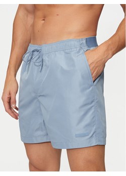 Calvin Klein Swimwear Szorty kąpielowe KM0KM01082 Niebieski Regular Fit ze sklepu MODIVO w kategorii Kąpielówki - zdjęcie 182719214
