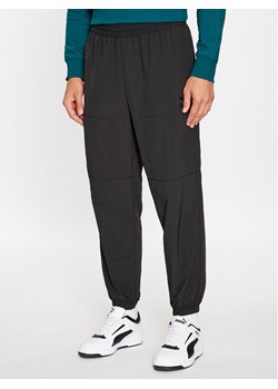 Puma Spodnie dresowe Classics Utility 622668 Czarny Regular Fit ze sklepu MODIVO w kategorii Spodnie męskie - zdjęcie 182719533