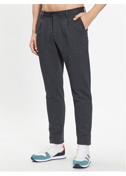 Tommy Hilfiger Spodnie materiałowe Hampton MW0MW32134 Szary Slim Fit ze sklepu MODIVO w kategorii Spodnie męskie - zdjęcie 182720221