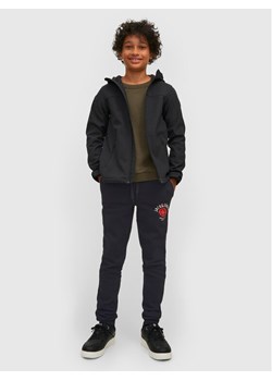 Jack&Jones Junior Spodnie dresowe Logo 12213086 Czarny Regular Fit ze sklepu MODIVO w kategorii Spodnie chłopięce - zdjęcie 182722980