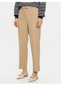 Tommy Hilfiger Chinosy WW0WW44090 Beżowy Regular Fit ze sklepu MODIVO w kategorii Spodnie damskie - zdjęcie 182723721