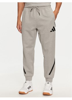 adidas Spodnie dresowe Z.N.E. JF2446 Szary Regular Fit ze sklepu MODIVO w kategorii Spodnie męskie - zdjęcie 182723892