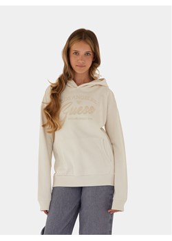 Guess Bluza J4RQ21 KA6R3 Beżowy Regular Fit ze sklepu MODIVO w kategorii Bluzy dziewczęce - zdjęcie 182724192