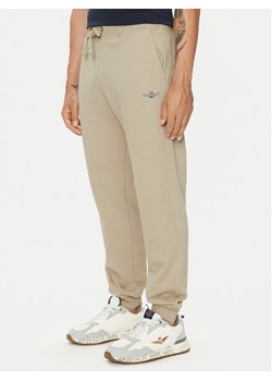 Aeronautica Militare Spodnie dresowe 242PF945F511 Beżowy Regular Fit ze sklepu MODIVO w kategorii Spodnie męskie - zdjęcie 182725813