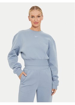 Reebok Bluza Fleece Coverup 100076122 Niebieski Regular Fit ze sklepu MODIVO w kategorii Bluzy damskie - zdjęcie 182726970