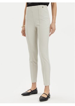 Tamaris Apparel Spodnie materiałowe Arad TAW0880 Écru Slim Fit ze sklepu MODIVO w kategorii Spodnie damskie - zdjęcie 182727140