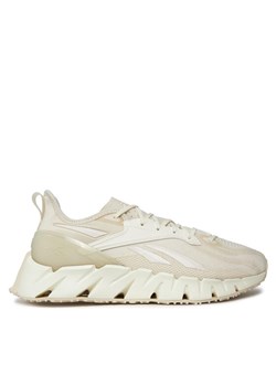 Reebok Sneakersy Zig Kinetica 3 IG2746 Beżowy ze sklepu MODIVO w kategorii Buty sportowe męskie - zdjęcie 182727750