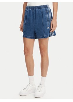 adidas Szorty jeansowe adicolor Denim Firebird JD2562 Niebieski Loose Fit ze sklepu MODIVO w kategorii Szorty - zdjęcie 182728662