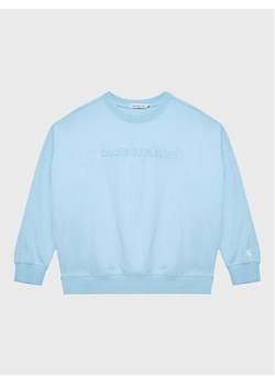 Calvin Klein Jeans Bluza Raised Embro IB0IB01670 Niebieski Regular Fit ze sklepu MODIVO w kategorii Bluzy chłopięce - zdjęcie 182730104