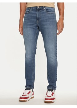 Tommy Jeans Jeansy Austin DM0DM21053 Niebieski Slim Tapered Fit ze sklepu MODIVO w kategorii Jeansy męskie - zdjęcie 182730291