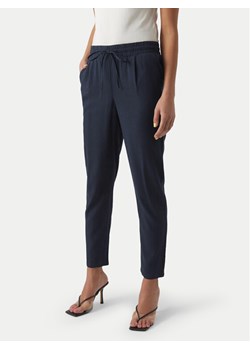 Vero Moda Spodnie materiałowe Jesmilo 10279691 Granatowy Regular Fit ze sklepu MODIVO w kategorii Spodnie damskie - zdjęcie 182732253
