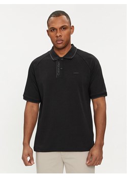 Calvin Klein Polo Logo Tape K10K112463 Czarny Regular Fit ze sklepu MODIVO w kategorii T-shirty męskie - zdjęcie 182732302