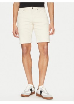 Calvin Klein Szorty jeansowe K10K114078 Écru Slim Fit ze sklepu MODIVO w kategorii Spodenki męskie - zdjęcie 182733230