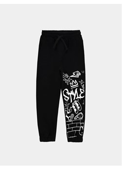 Coccodrillo Spodnie dresowe ZC3120102ASK Czarny Slim Fit ze sklepu MODIVO w kategorii Spodnie chłopięce - zdjęcie 182734174
