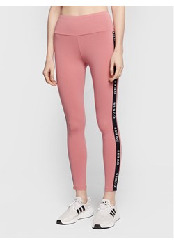 Guess Legginsy Aline V2YB14 KABR0 Różowy Slim Fit ze sklepu MODIVO w kategorii Spodnie damskie - zdjęcie 182736170