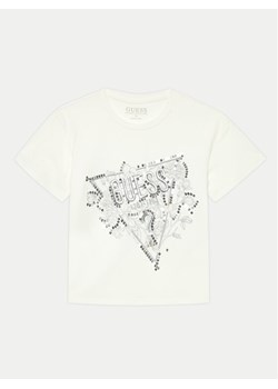 Guess T-Shirt J4YI30 K6YW4 Beżowy Regular Fit ze sklepu MODIVO w kategorii Bluzki dziewczęce - zdjęcie 182736293