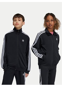adidas Bluza Firebird IY9800 Czarny Regular Fit ze sklepu MODIVO w kategorii Bluzy chłopięce - zdjęcie 182736552