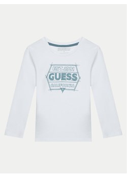 Guess Bluzka N5RI26 K8HM4 Biały Regular Fit ze sklepu MODIVO w kategorii Bluzki dziewczęce - zdjęcie 182737520