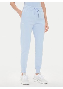 Under Armour Spodnie dresowe Ua Rival Fleece Jogger 1379438-539 Niebieski Loose Fit ze sklepu MODIVO w kategorii Spodnie damskie - zdjęcie 182738604