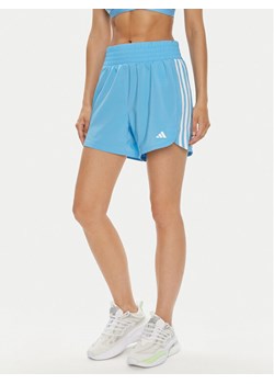 adidas Szorty sportowe Pacer Training 3-Stripes IS1664 Błękitny Regular Fit ze sklepu MODIVO w kategorii Szorty - zdjęcie 182738741