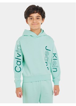 Calvin Klein Jeans Bluza Maxi Inst Logo IB0IB02040 Niebieski Relaxed Fit ze sklepu MODIVO w kategorii Bluzy chłopięce - zdjęcie 182740081