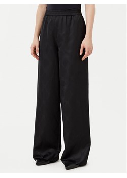 HUGO Spodnie materiałowe Harida-1 50538802 Czarny Relaxed Fit ze sklepu MODIVO w kategorii Spodnie damskie - zdjęcie 182740344