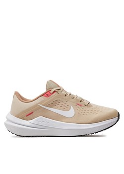 Nike Buty do biegania Air Winflo 10 DV4023 100 Beżowy ze sklepu MODIVO w kategorii Buty sportowe damskie - zdjęcie 182741564