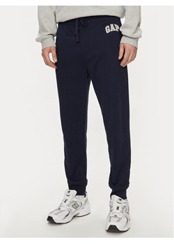 Gap Spodnie dresowe 868463-01 Granatowy Regular Fit ze sklepu MODIVO w kategorii Spodnie męskie - zdjęcie 182742033