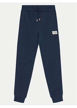 Tommy Hilfiger Spodnie dresowe KB0KB09308 Granatowy Regular Fit ze sklepu MODIVO w kategorii Spodnie chłopięce - zdjęcie 182742171