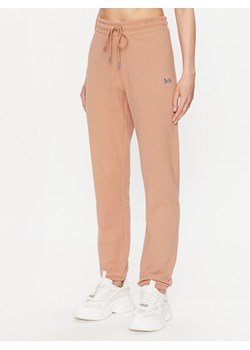 DKNY Sport Spodnie dresowe DP2P3114 Brązowy Regular Fit ze sklepu MODIVO w kategorii Spodnie damskie - zdjęcie 182742851