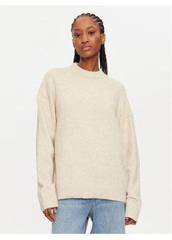 Calvin Klein Sweter J20J224636 Brązowy Regular Fit ze sklepu MODIVO w kategorii Swetry damskie - zdjęcie 182743580